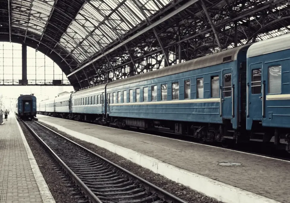 Empty platform with distant blue carriage